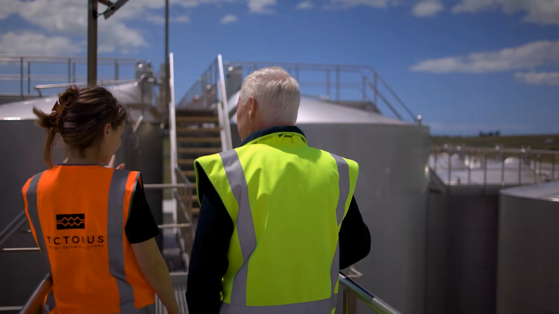 The Tectonus team walking the Yealands winery tanks in branded hi-vis